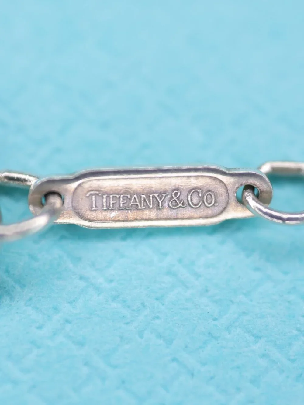 Tiffany & Co. Three Hearts Pendant on 16
